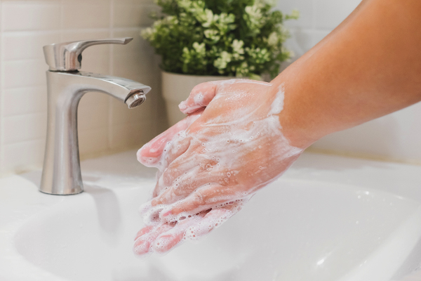 employee washing hands
