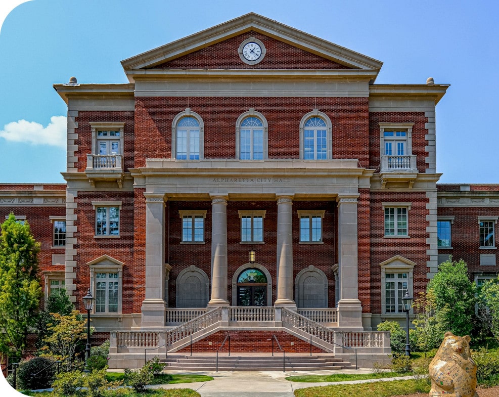 old fashioned red brick business office exterior during the morning